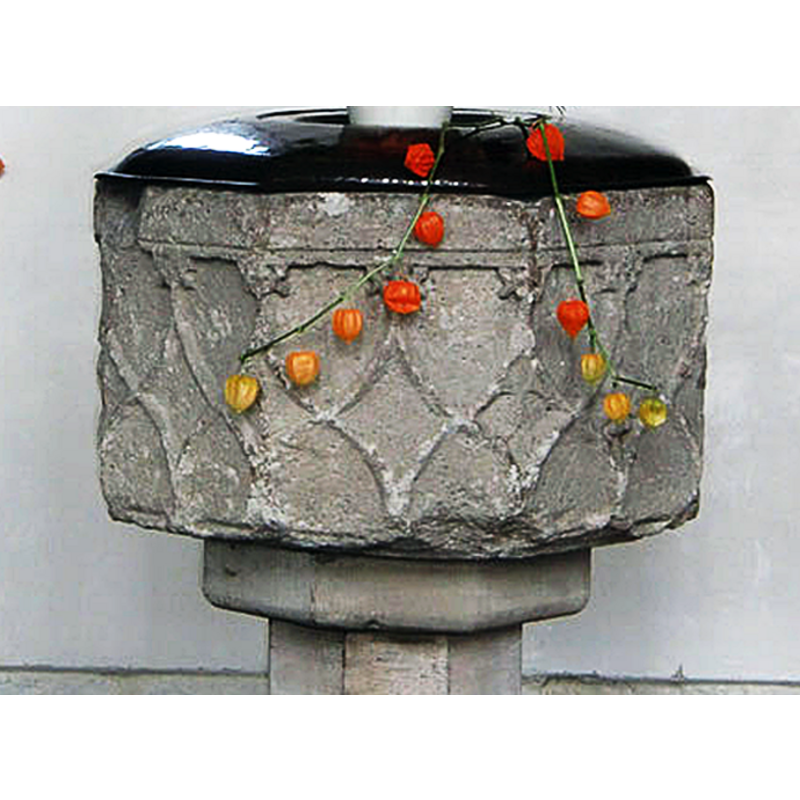 a row of tiny ones -- notice the large damaged area on the left side of the basin; given its location it was pronanly caused by a cover metal anchor splitting the stone