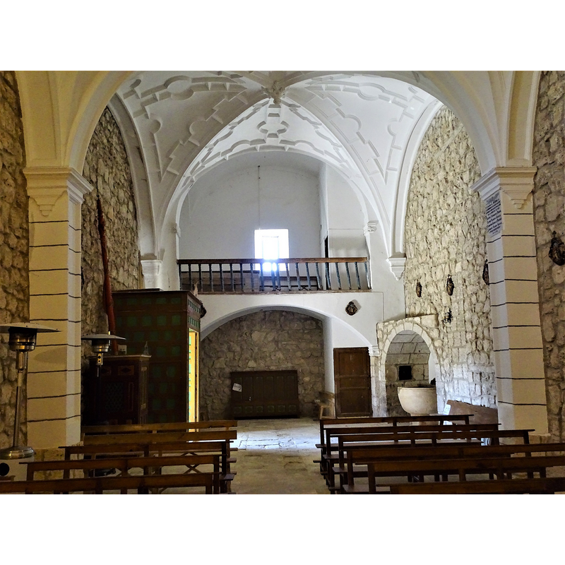the baptistery alcove and font are visible on the right [north] side