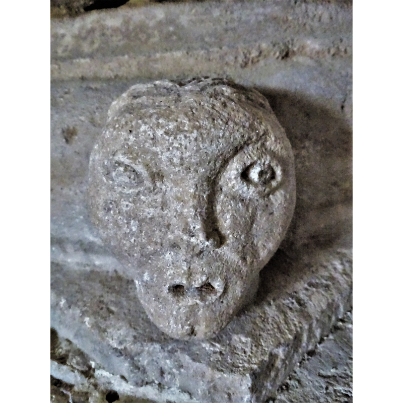 one of four heads set at 90-degree angles on the lower base