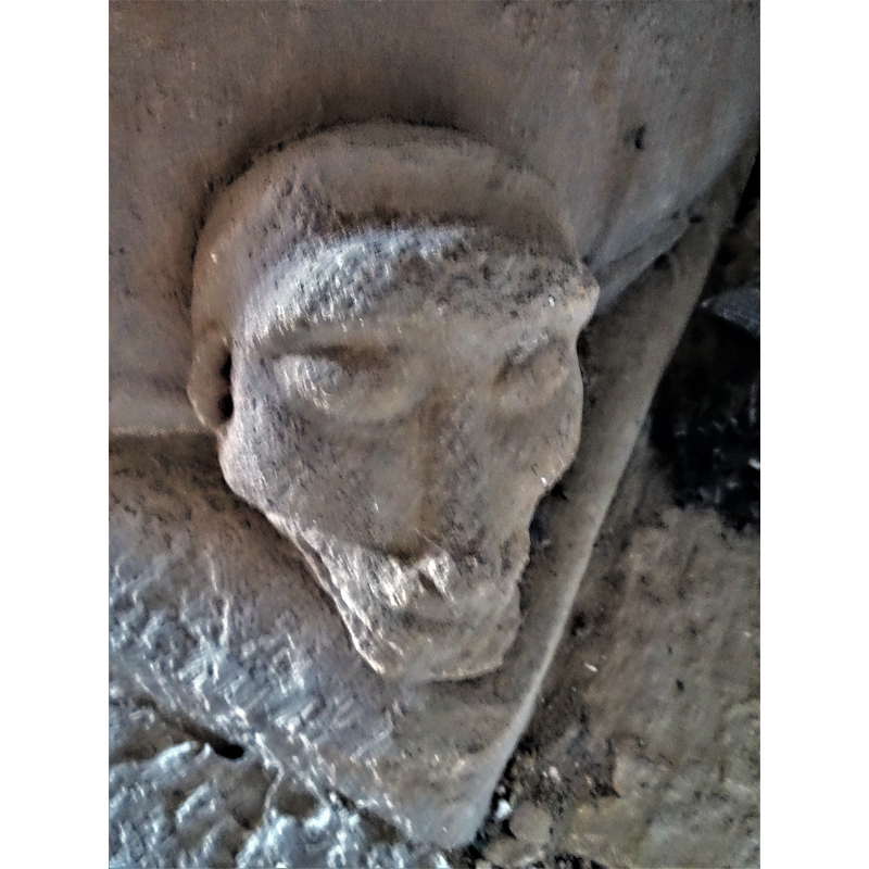 one of four heads set at 90-degree angles on the lower base
