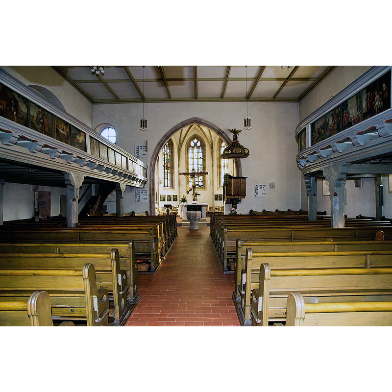 showing the baptismal font at the east end of the central aisle