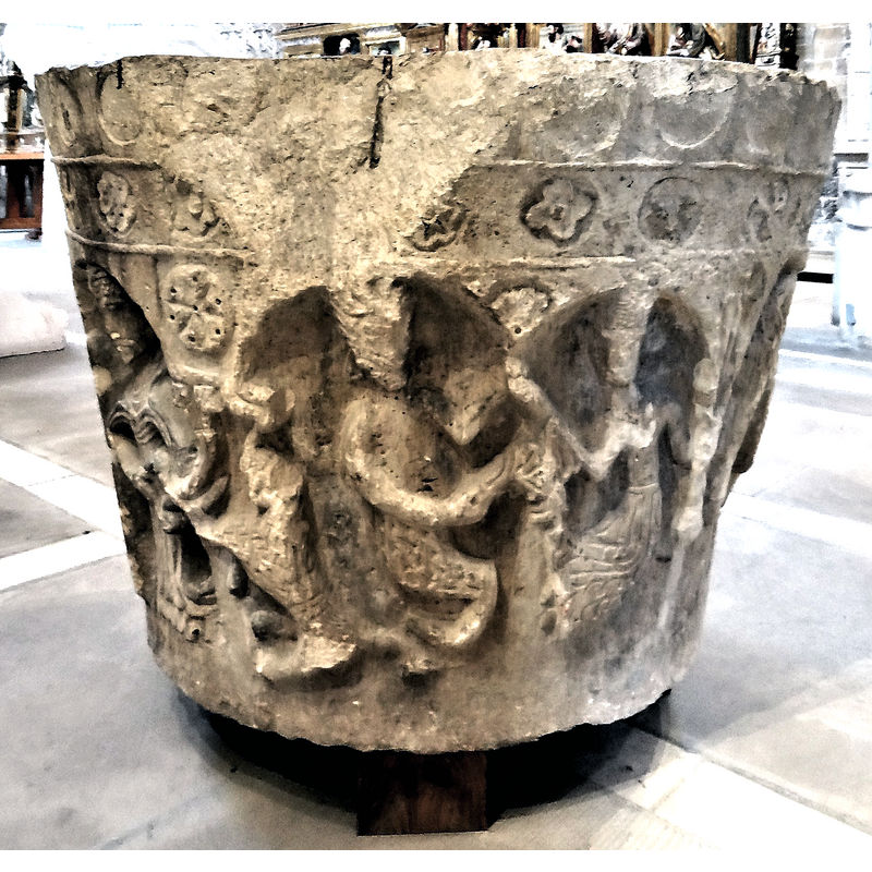 the bapttismal font originally from Albacastro -- notice the large damage at the upper rim caused by a metal anchoring from an old cover