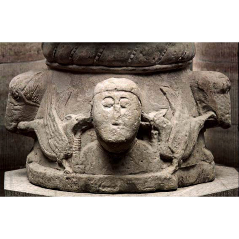 three of them are visible here: a human head in the centre and two animal heads on the sides; the fourth head, which would have been at the back, has been lost