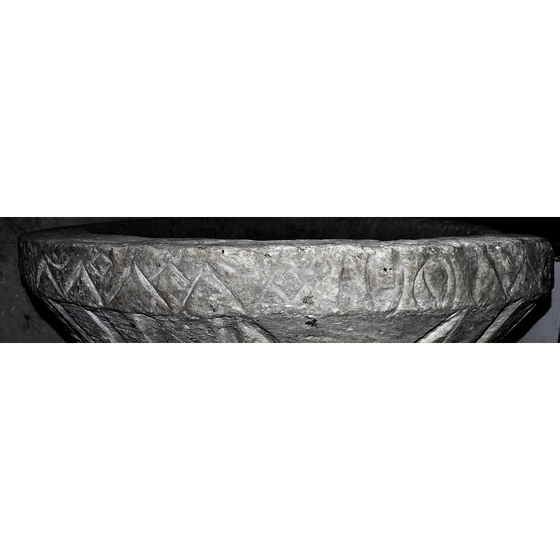 an assortment of motifs and patterns all around the basin sides; some damaged, worn, all around