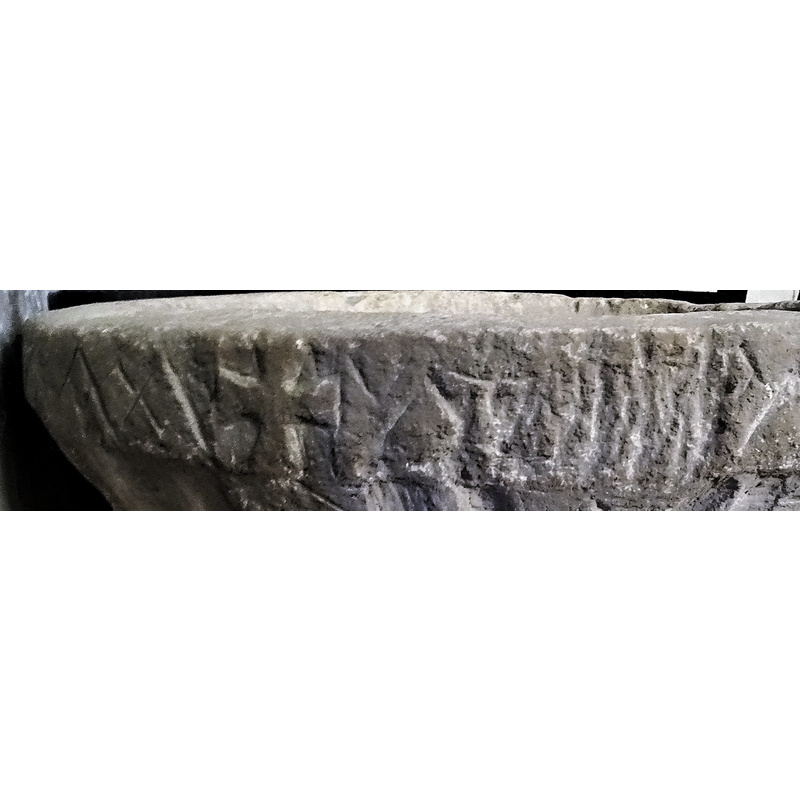 damaged/worn, to the right of the Maltese cross
