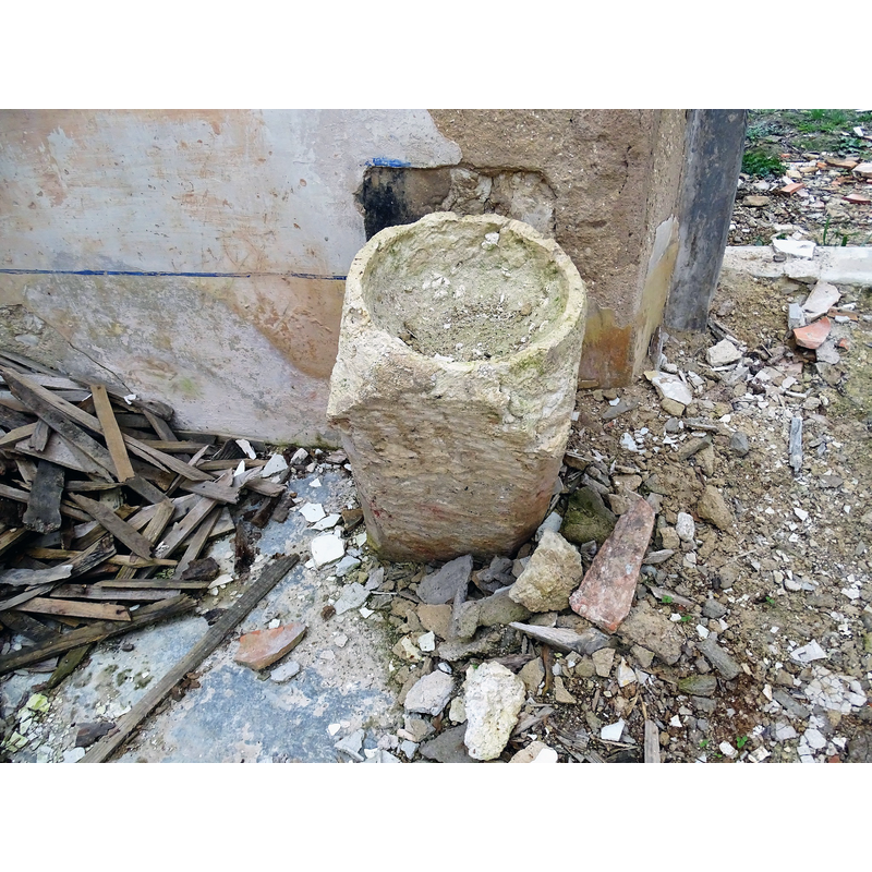 the ruined church in January 2023 -- a holy-water stoup?