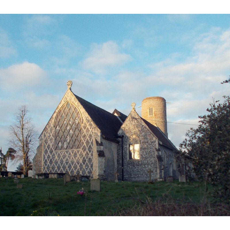 Source caption: "Barsham church, Suffolk, from the NE, showing the east gable and window with fretty tracery and flushwork, possibly representing the heraldic bearing of the Echyngham family."