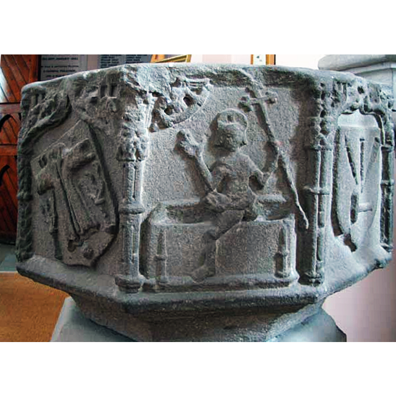 Source caption: ""Meigle church font bowl, showing faces on which the Resurrection and the Instruments of the Passion are depicted"