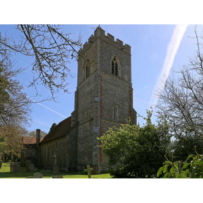 Source caption: "A view across the churchyard to the north-east of St Martin's Church, White Roding, Essex, England."