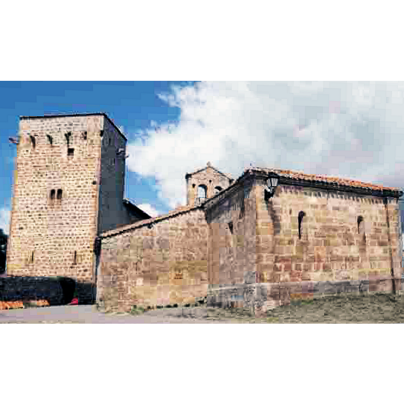 Source caption: "La iglesia de San Pablo junto a la torre medieval de los Bustamante"