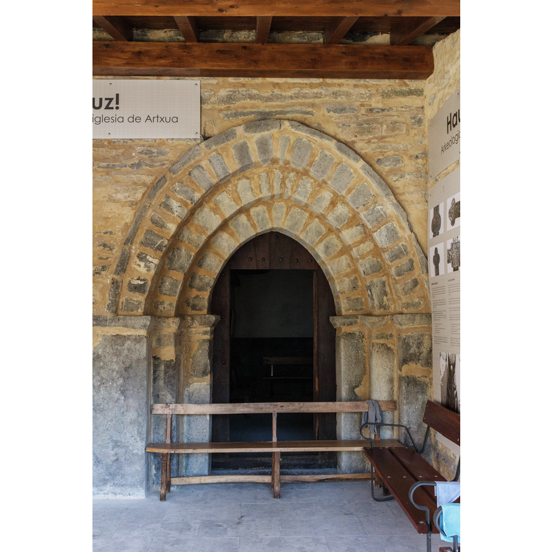 Source caption: "Artxuako San Sebastian eliza" -- the old church after the restoration