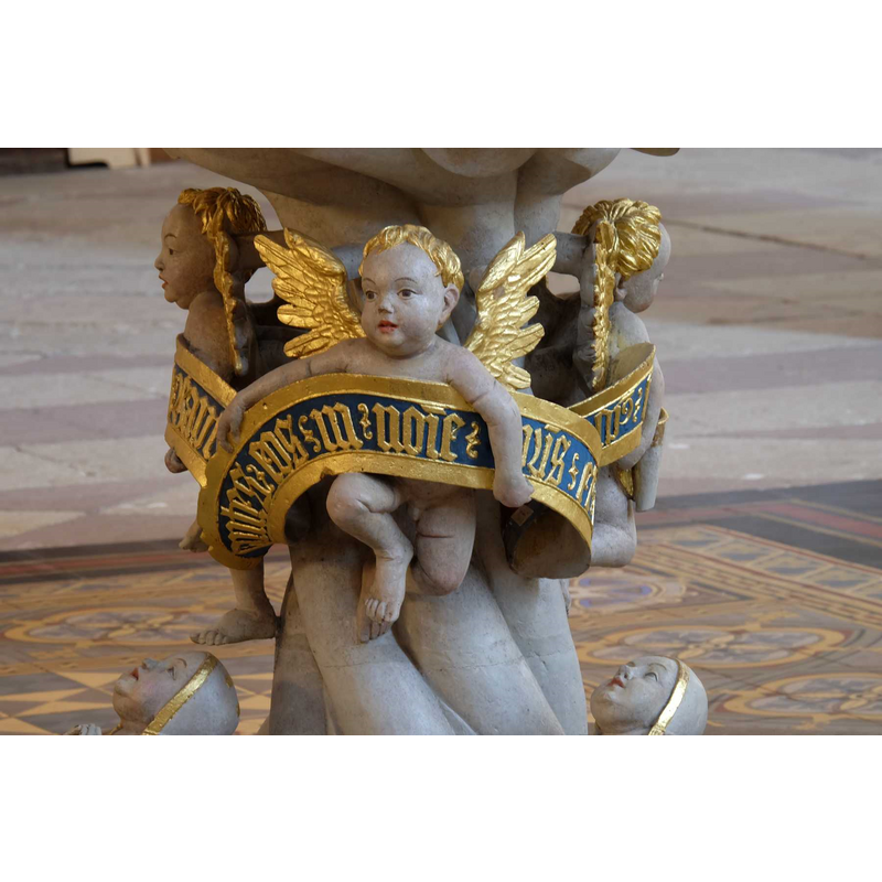 on the upper part of the pedestal base