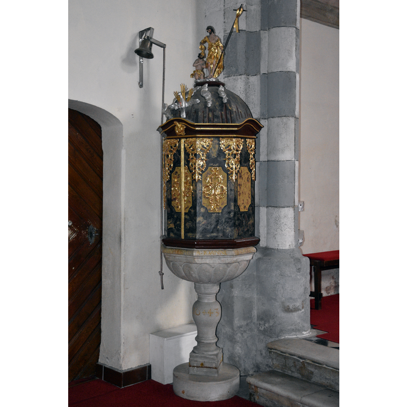 Source caption: "St. Elizabeth of Hungary Parish Church (Slovenj Gradec) - Interior" -- the font and cover in the northeast corner, by the sacristy doorway