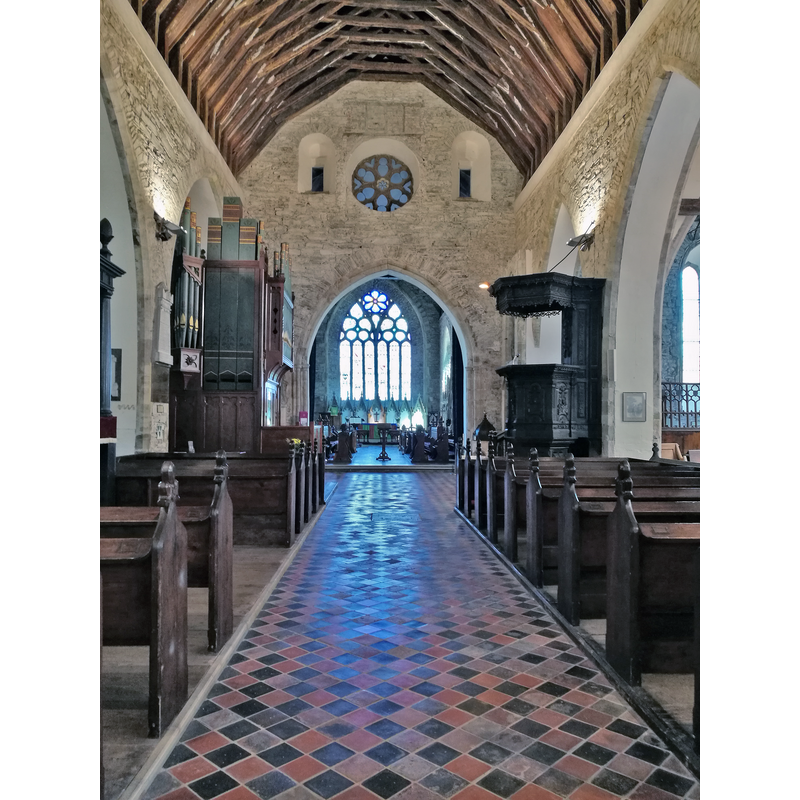 the font and cover are partially visible on the right side, near the pulpit
