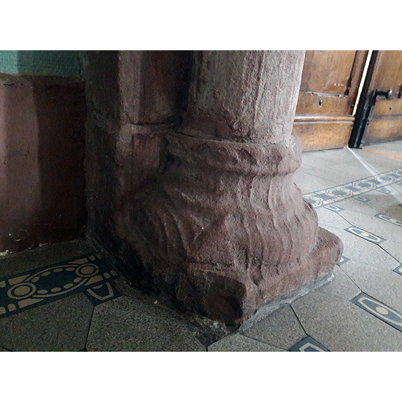 the very eroded round-to-square lower base