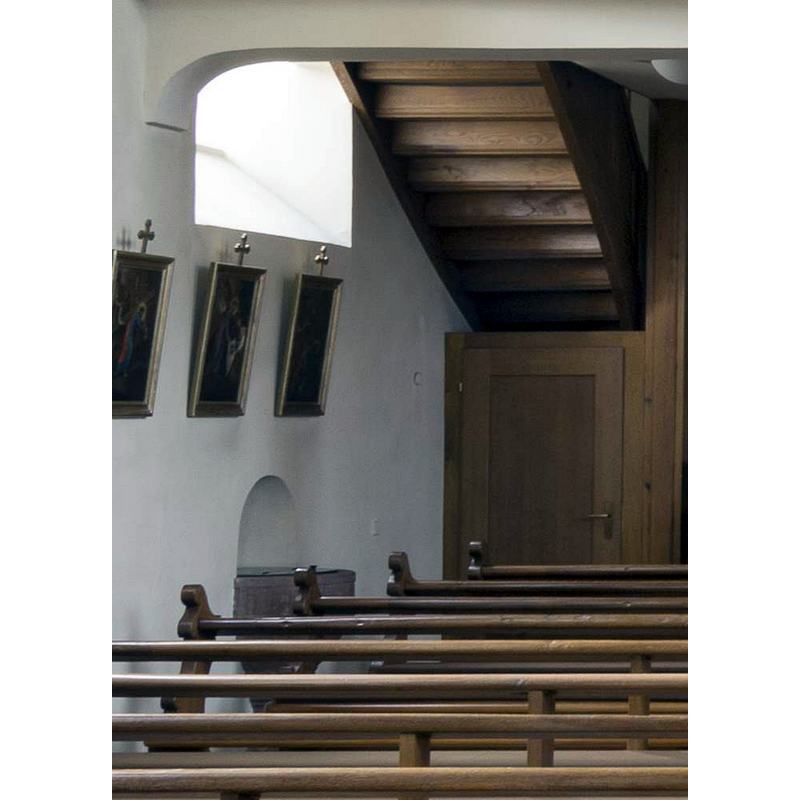 the later font half-built into the south wall the nave, beneath the west gallery stairs