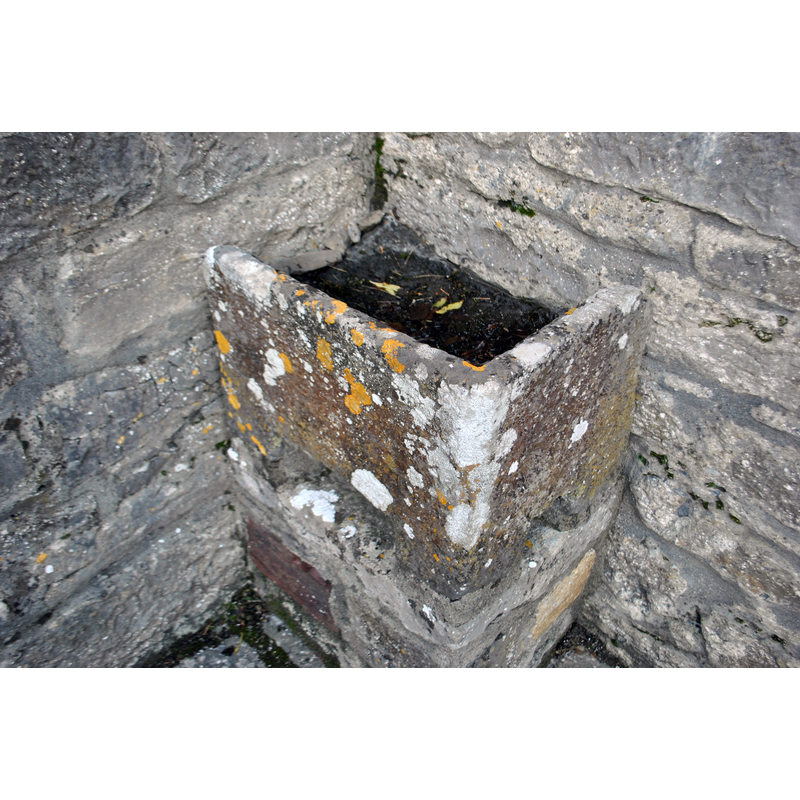 Source caption: "Late medieval rectangular baptismal font."