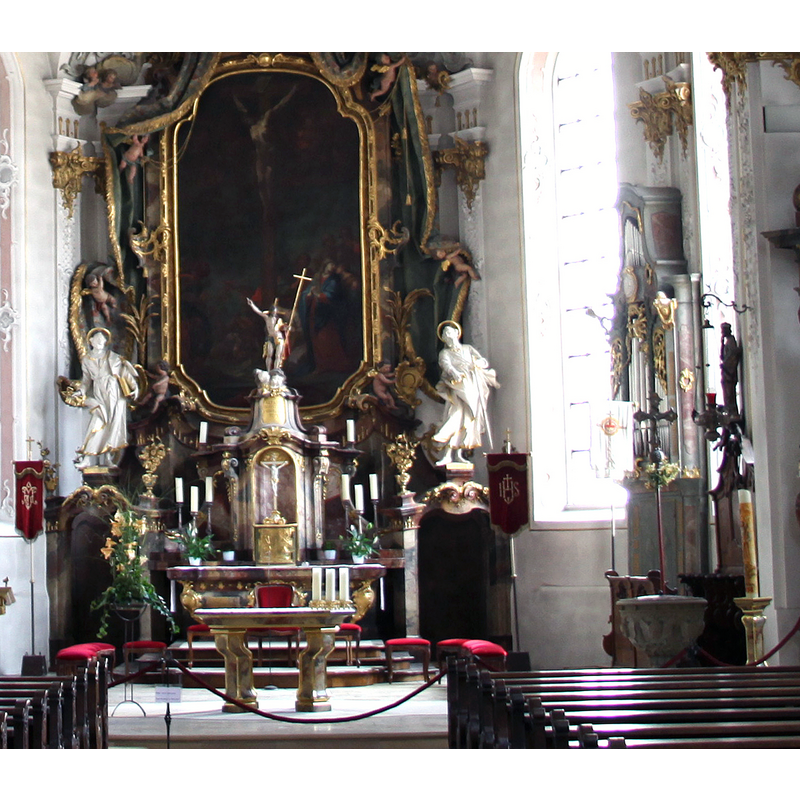 partially showing the restored 19thC font in the bottom-right corner of the image