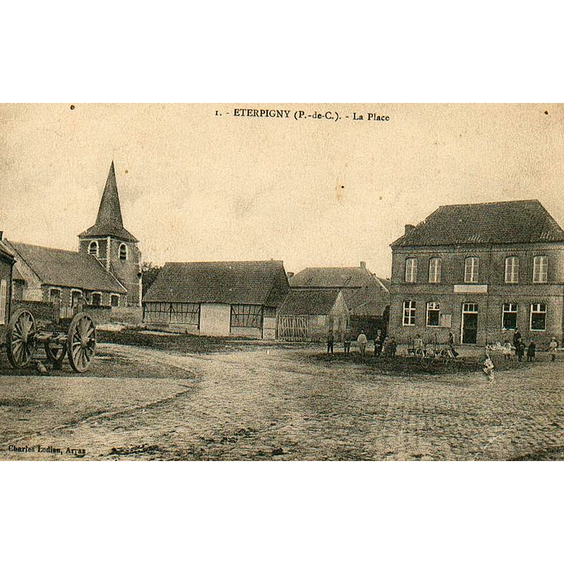 the village square with a view of the church on the left; the church would be destroyed in 1917(?) in WWI and re-built thereafter