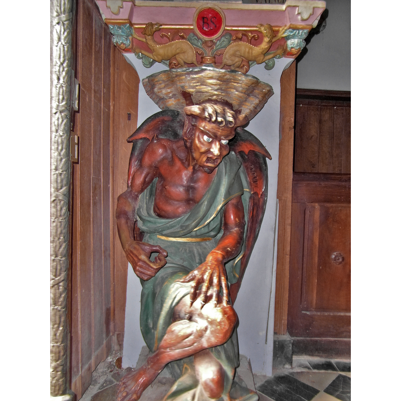 Source caption: "Le diable de Rennes le Chateau", on the famous late-19thC stoup [NB: after several attacks on the figure the whole stoup is now [2021+] inside a protective casing]