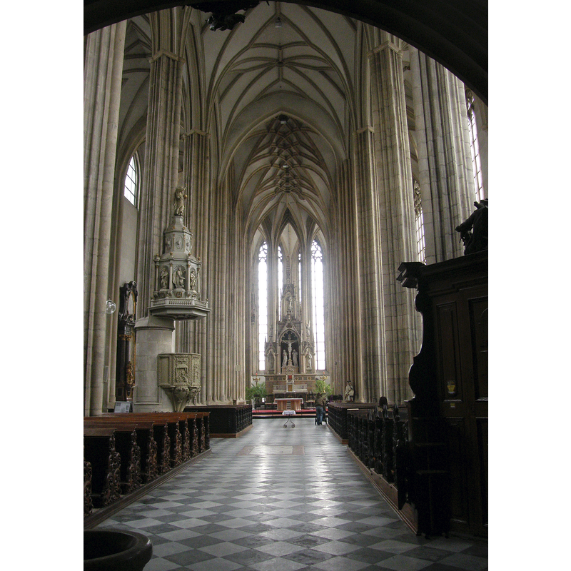 Source caption: "Kostel sv. Jakuba (Brno), Brno - město, nám. Jakubské, Brno" -- showing in the bottom-left corner is the top of the holy-water stoup said to have been a font in a maternity hospital