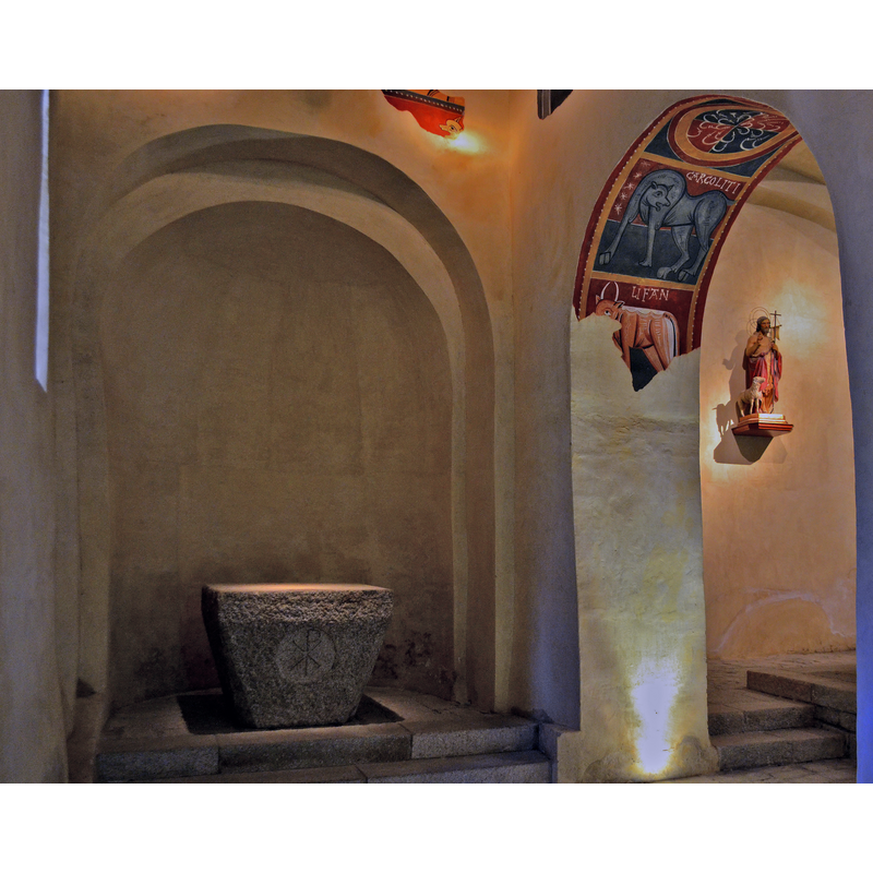 Source caption: "Església de Sant Joan de Boí (la Vall de Boí)" -- stone altar in the apse