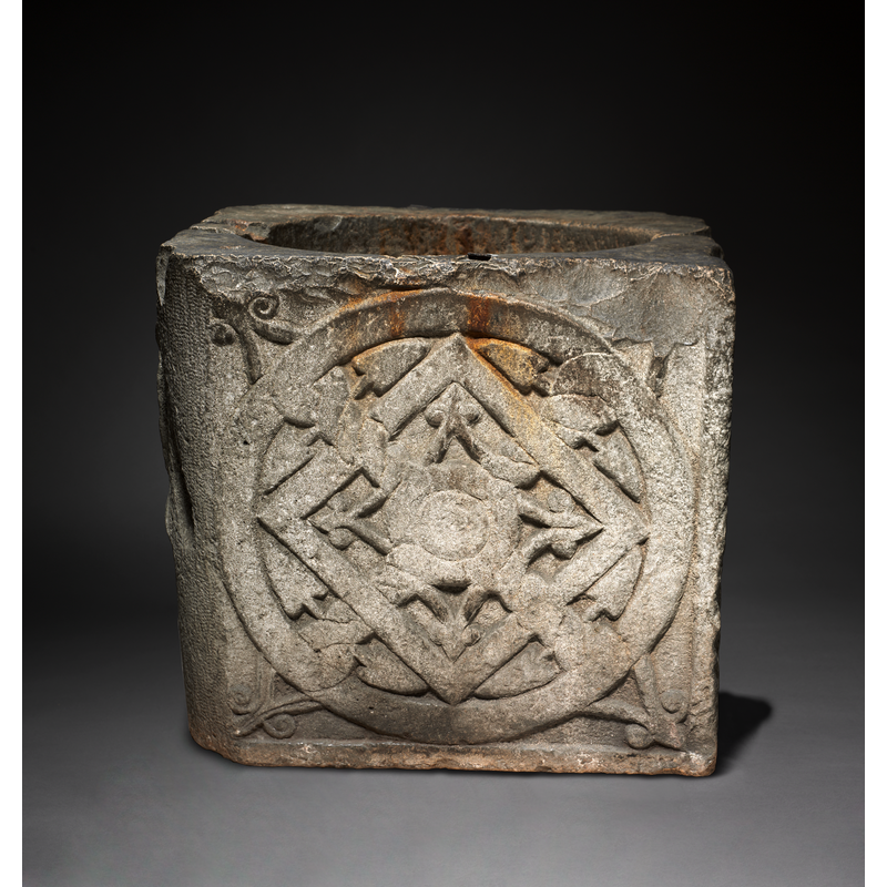 described in the Museum entry as: "Well Head 700s-800s. Lombardic, Italy, Venice(?), Migration period. Limestone Overall: 66.7 x 77.5 x 79.4 cm (26 1/4 x 30 1/2 x 31 1/4 in.) Weight: 1150 lbs."