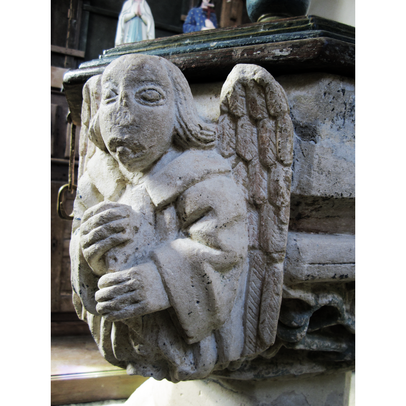 one of the objects looks like a scroll but Vivier [cf. FonfNotes] thinhs they were used to hold a candle in each