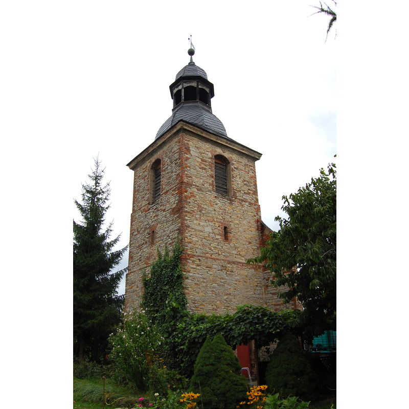 Source caption: "Dorfkirche Felgeleben. Turm der Martin-Luther-Kirche" -- this is the Evangelish Martin-Luther Kirche in Felgeleben, where the font now in Sandau came from [its coordinates: 52° 0′ 1.24″ N, 11° 45′ 12.35″ E, 52.000344°, 11.753431°, UTM 	32U 689006 5764656 -- its location: near Schönebeck (Elbe), in Salzlandkreis, Sachsen-Anhalt]