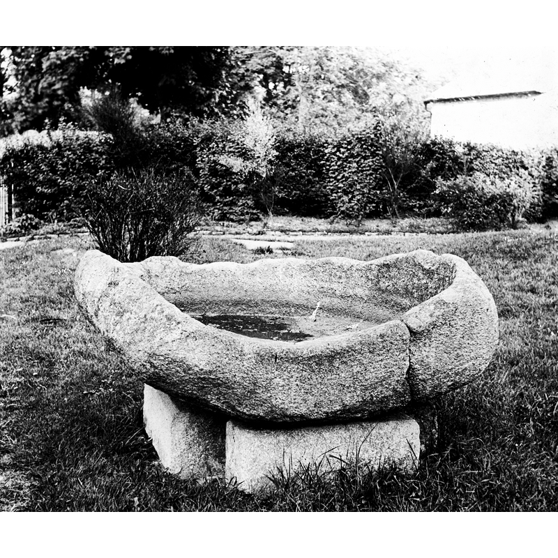 Source caption: "This enormous stone bowl or font stands/stood in Tallaght in South County Dublin. The creation of such a font must have been a great undertaking at the time and have taken a long time to complete. What was it used for and is it still in situ? While I have the vaguest of notions that we have come across archaic words for a font previously ("pant"?), I do not think we've encountered the word "losset" before. But, apparently, this is what we have here. Losset is an old-Irish word for a trough, and this example is St. Maelruan's Losset in Tallaght. Apparently used for ceremonial feet bathing (rather than as a baptismal font), it seems quite ancient. Though, was apparently moved in the very late 19th century - perhaps dating this image to after c.1899..."
