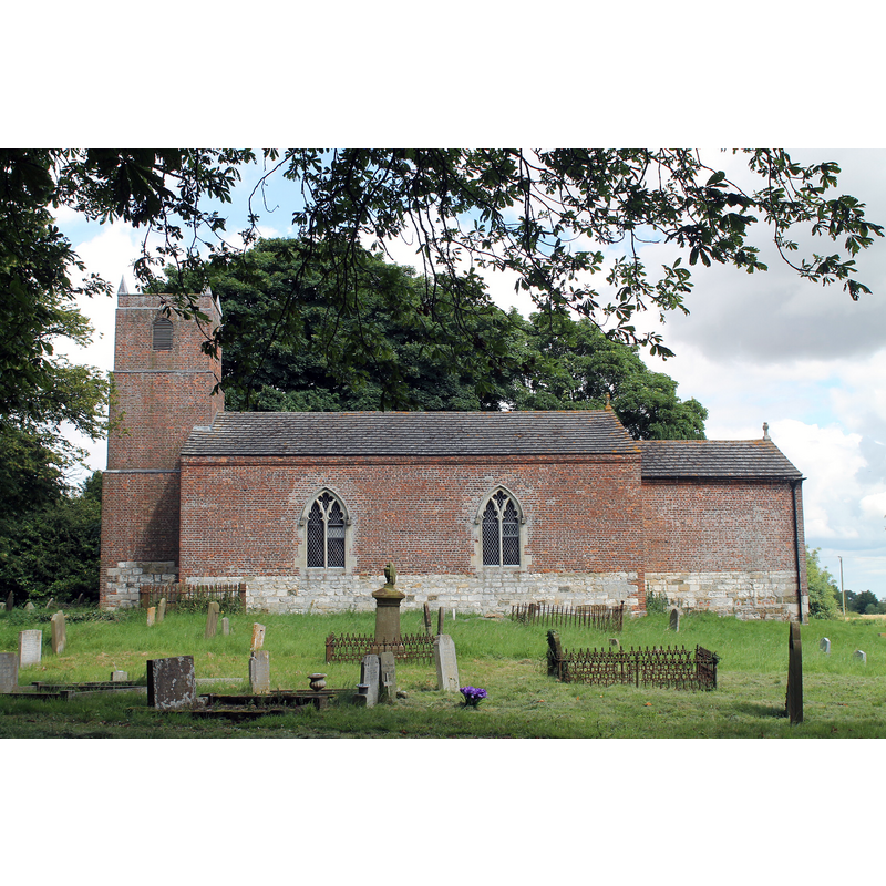 Source caption: "St Martin's Church, Welton Le Marsh. The church has a medieval base and was rebuilt in later 18th C. in red brick. Western tower. The inside is very plain with a 15th C octagonal font."