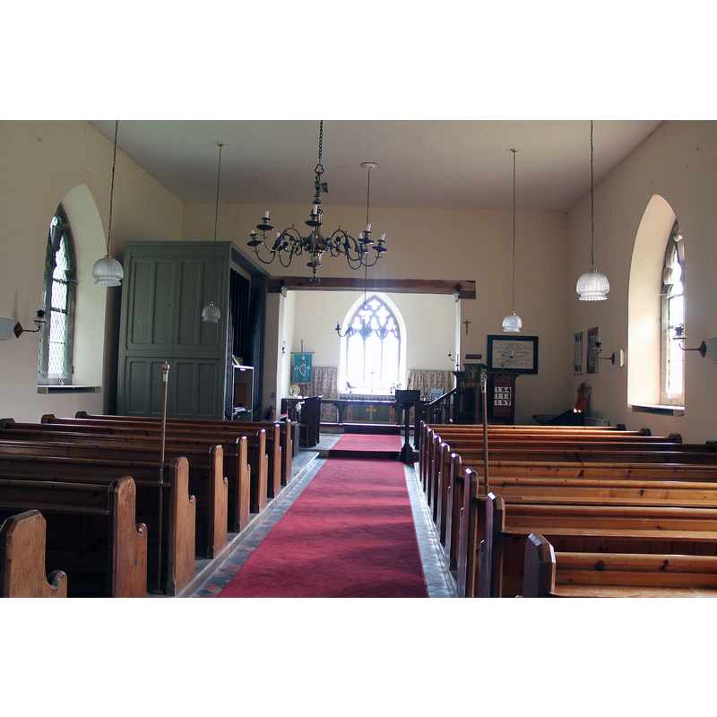 Source caption: "St Martin's Church, Welton Le Marsh. The church has a medieval base and was rebuilt in later 18th C. in red brick. Western tower. The inside is very plain with a 15th C octagonal font."