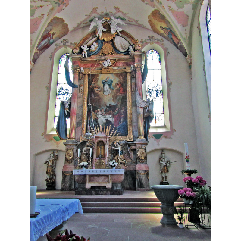 showing the baptismal font in the bottom-right corner of the image