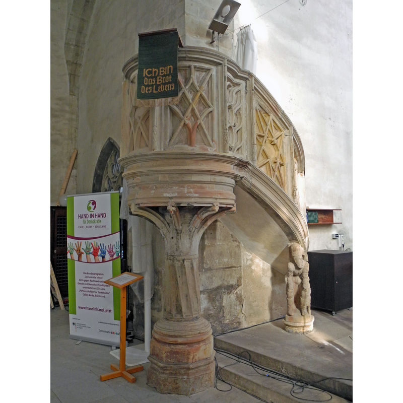 Source caption: "Kanzel der Stephanikirche in Calbe (Saale), Kirchplatz - Sandsteinkanzel im Renaissancestil, errichtet 1561 von Urban Hachenberg aus Aderstedt bei Bernburg." -- the same date as the baptismal font