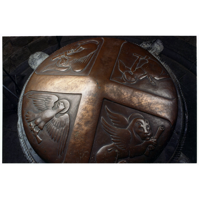 the symbols of the Four Evengelists in the quarters of the 1948 font cover
