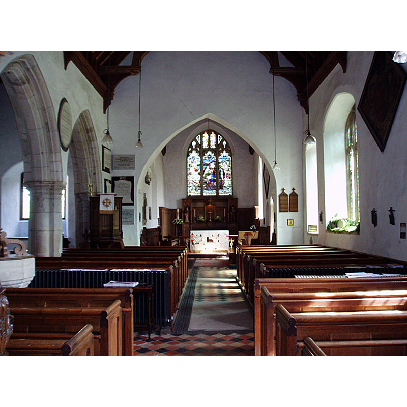 Source caption: "Sandon - St Andrew's Church. The church interior." -- showing the font and cover partially on the left