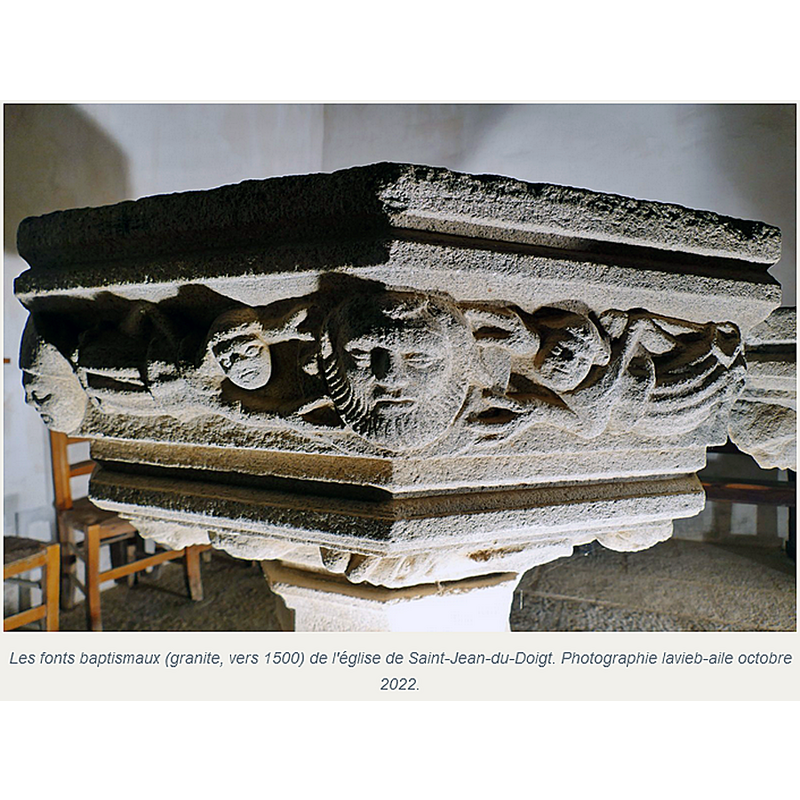 the two sides of the basin focus on the bearded head in the centre, with the floating figures on the sides holding the round surface on which the head appears to stand -- the scene has been described in one source as a pair of angels holding the decapitated head of John the Baptist on a platter [cf. FontNotes]