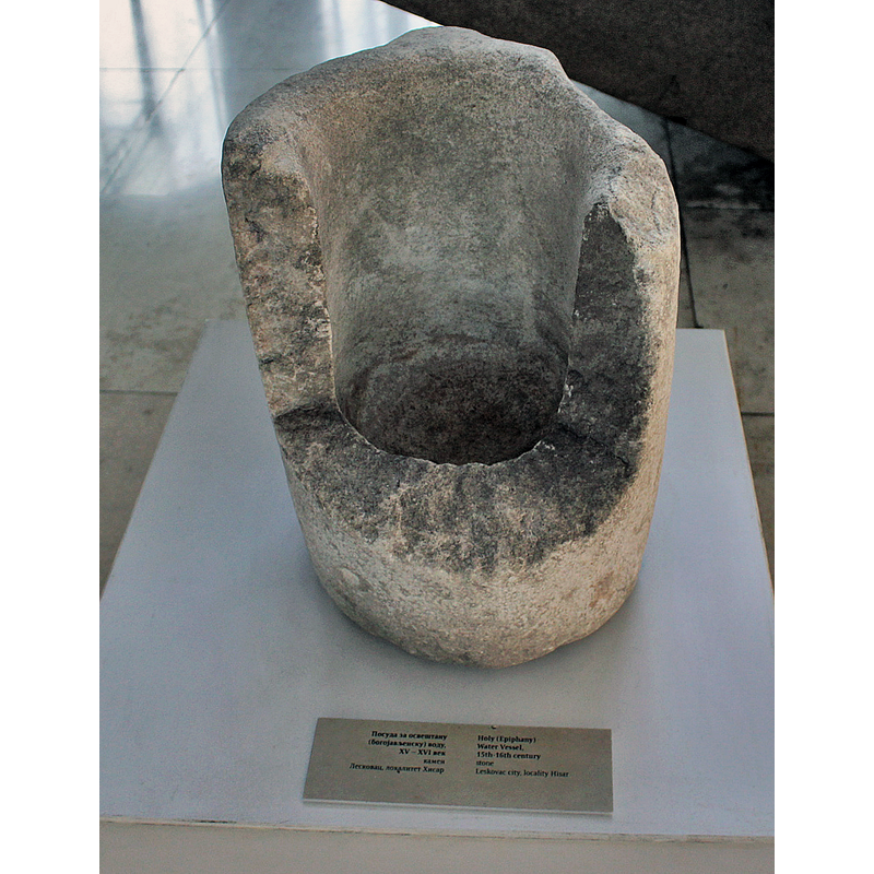 Source caption: "Holy (Epiphany) water vessel, 15th-16th century. Stone, Leskovac, locality Hisar / Posuda za osveštanu (bogojavljensku) vodu, 15-16 vek. Kamen, Leskovac, lokalitet Hisar." -- this one much damaged