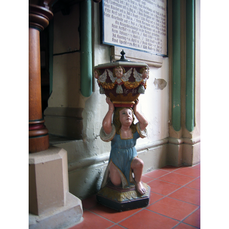 and holding up the basin