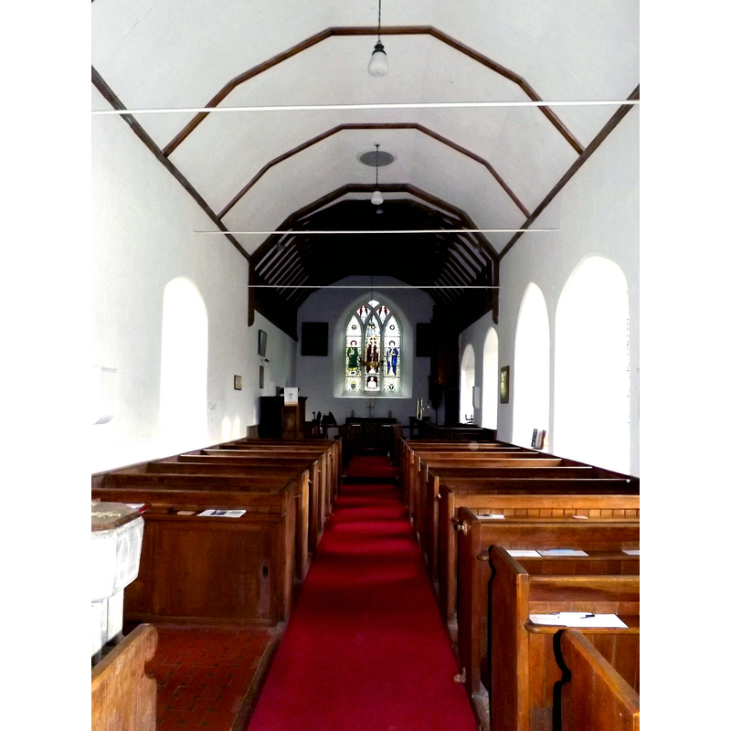 Source caption: "Inside St.Lawrence Church" -- the old font is partially visible in the bottom-left corner of the image