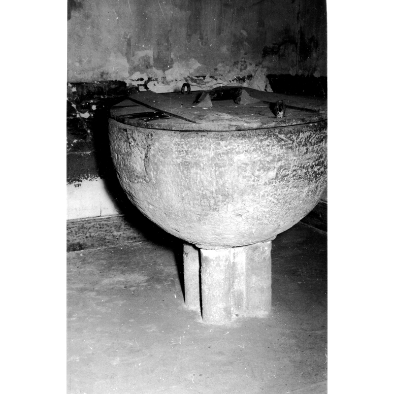 notice that the lower base is not visible here; was it buried in the flooring? missing?