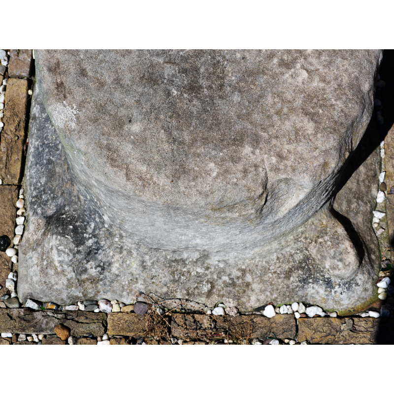 the damage above the foot would probably have been the location of one of four figures or animals