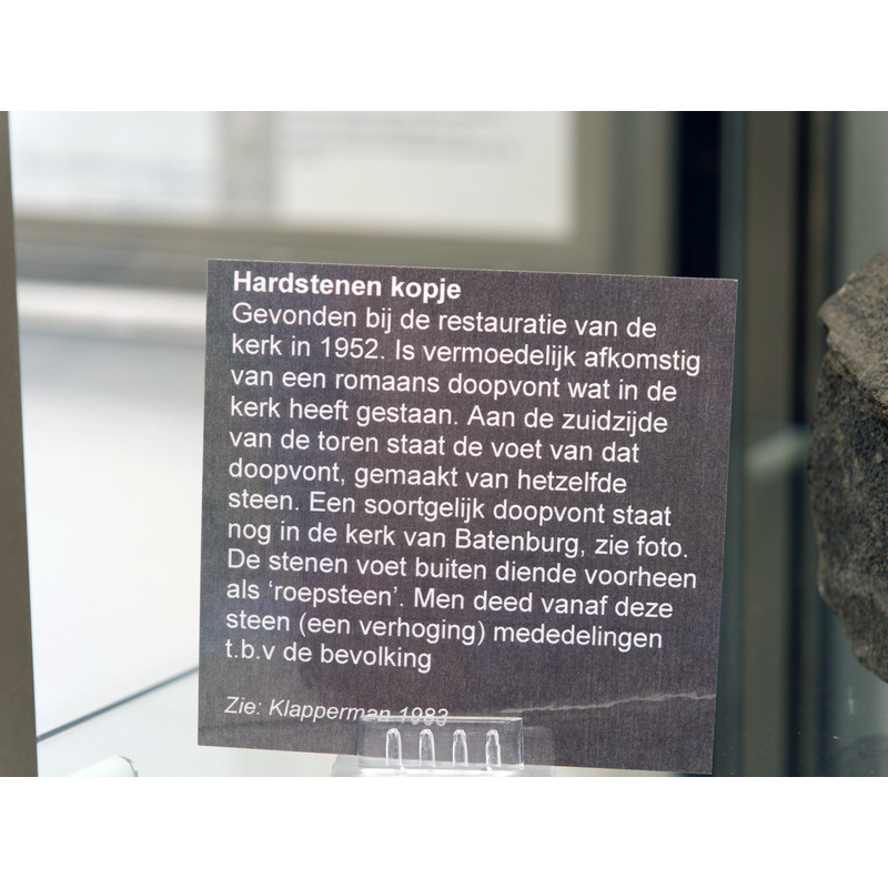 museum label for the human head fragment