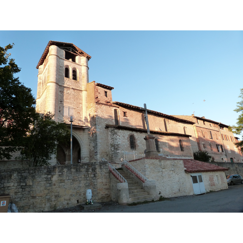 Source caption: "Église Saint-Barthélemy de Castelnau-de-Lévis. Façade sud-ouest de l'église et de son porche"