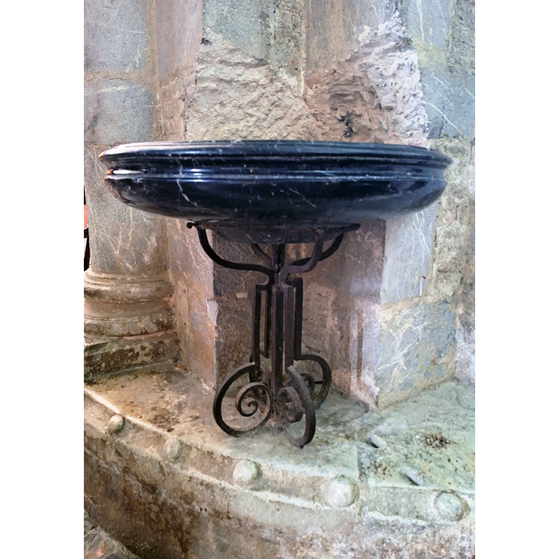 one of several later-date stoups in the church