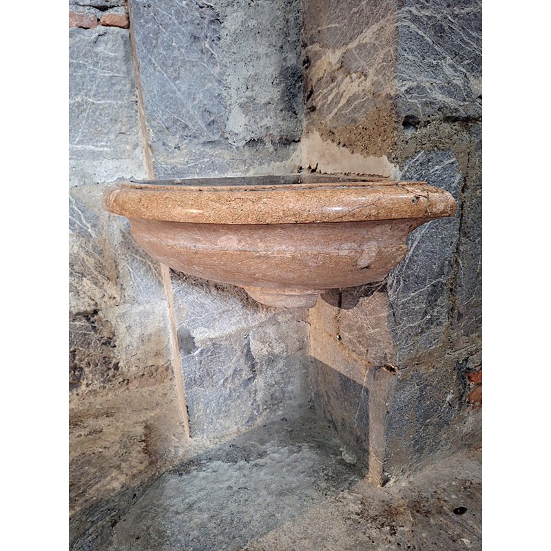 one of several later-date stoups in the church