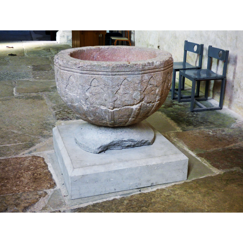 showing the damage to the original lower base; the stem of the original base is lost