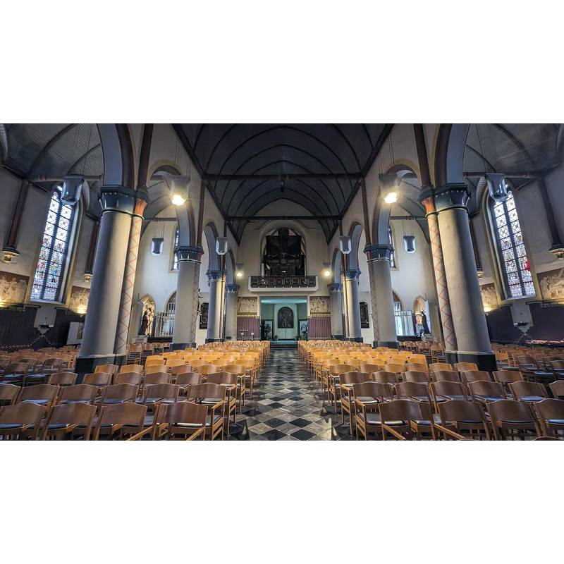 Source caption: "Sint-Mauritiuskerk (Bilzen) achterzijde"