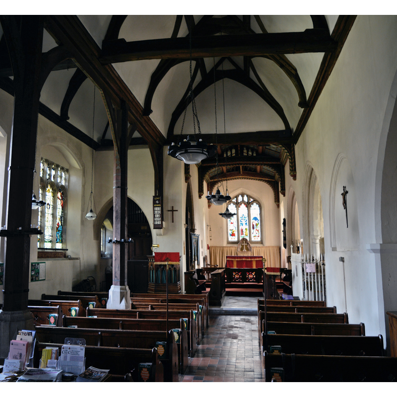 Source caption: "St Margaret, Mapledurham. The interior, looking East. William Butterfield restored the church in 1863 and he created an internal North aisle by inserting the oak arcade seen here. He also adapted the medieval roof. The South aisle is unusual in that it is not accessible from inside the church, only from an external door. It is the private property of Mapledurham House and its Catholic owners."