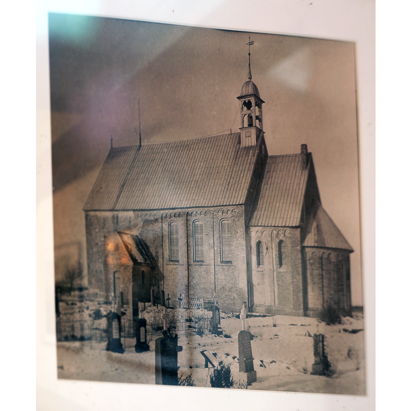 edited image of an old photograph displayed in the west porch